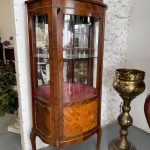 antique wooden display cabinet with bronze mounts