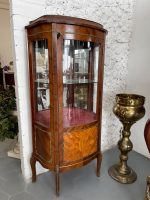 antique wooden display cabinet with bronze mounts