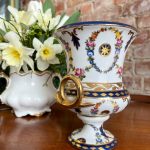 Small Meissen style porcelain urn vase with floral garlands