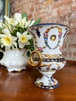 Small Meissen style porcelain urn vase with floral garlands