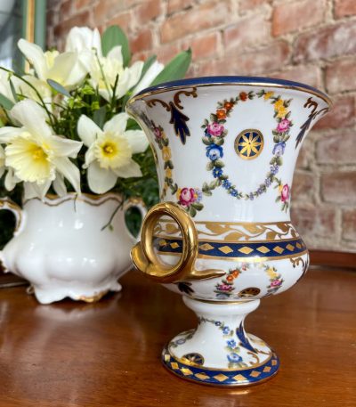 Small Meissen style porcelain urn vase with floral garlands