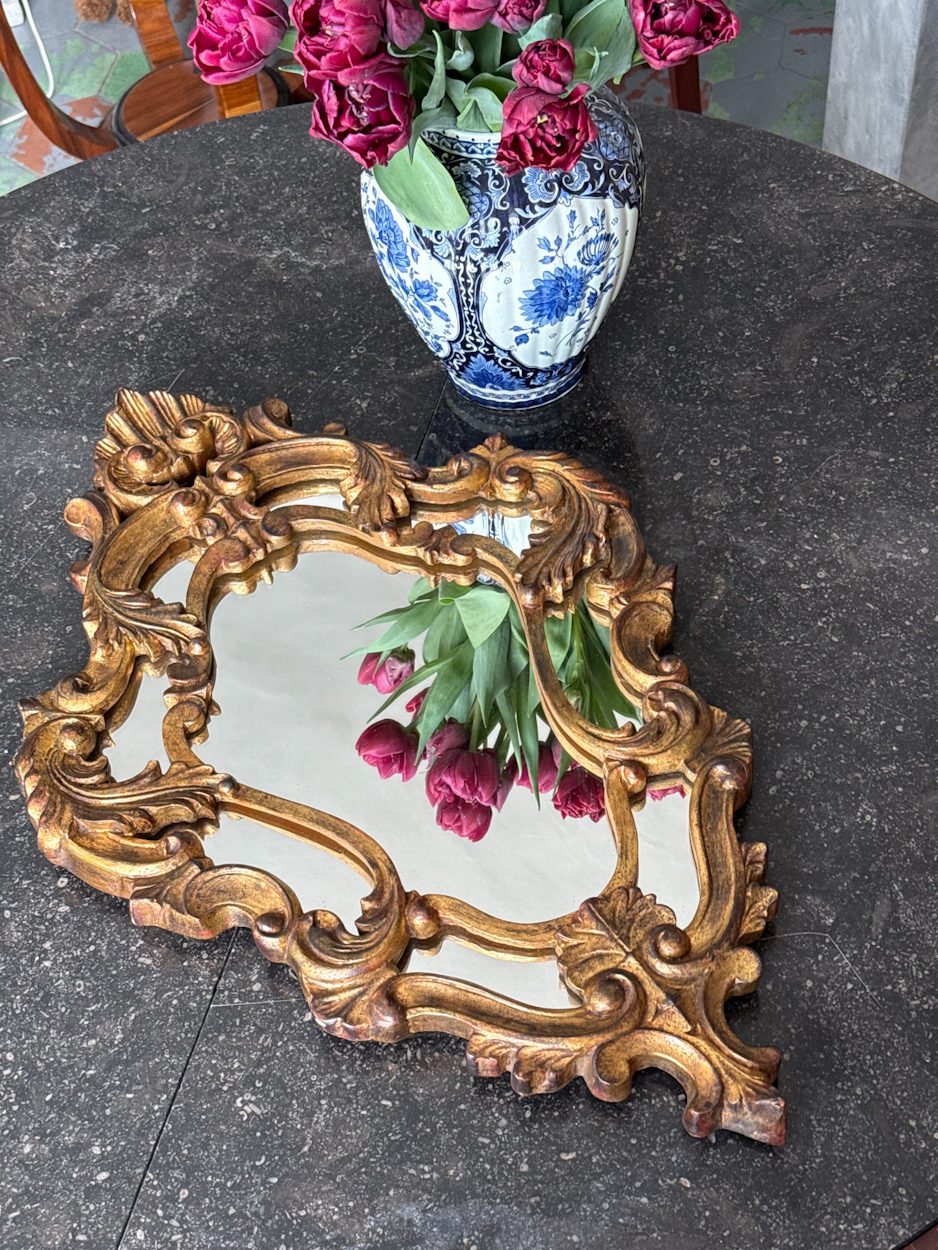 Ornate gold Rococo revival wall mirror