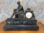 Antique french marble mantle clock with bronze figure of a writer