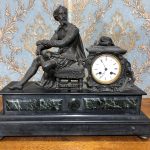 Antique french marble mantle clock with bronze figure of a writer