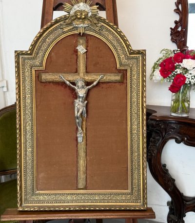 antique crucifix framed velvet cherubs
