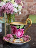 porcelain cup with saucer and gold lion paw feet