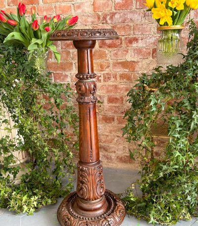 Carved walnut plant stand pedestal column with acanthus capital and round base
