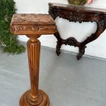 Carved walnut pedestal column with fluted shaft and foliate-carved square top