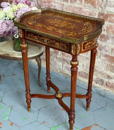 Antique Louis XVI style mahogany side table with floral marquetry inlay and brass gallery