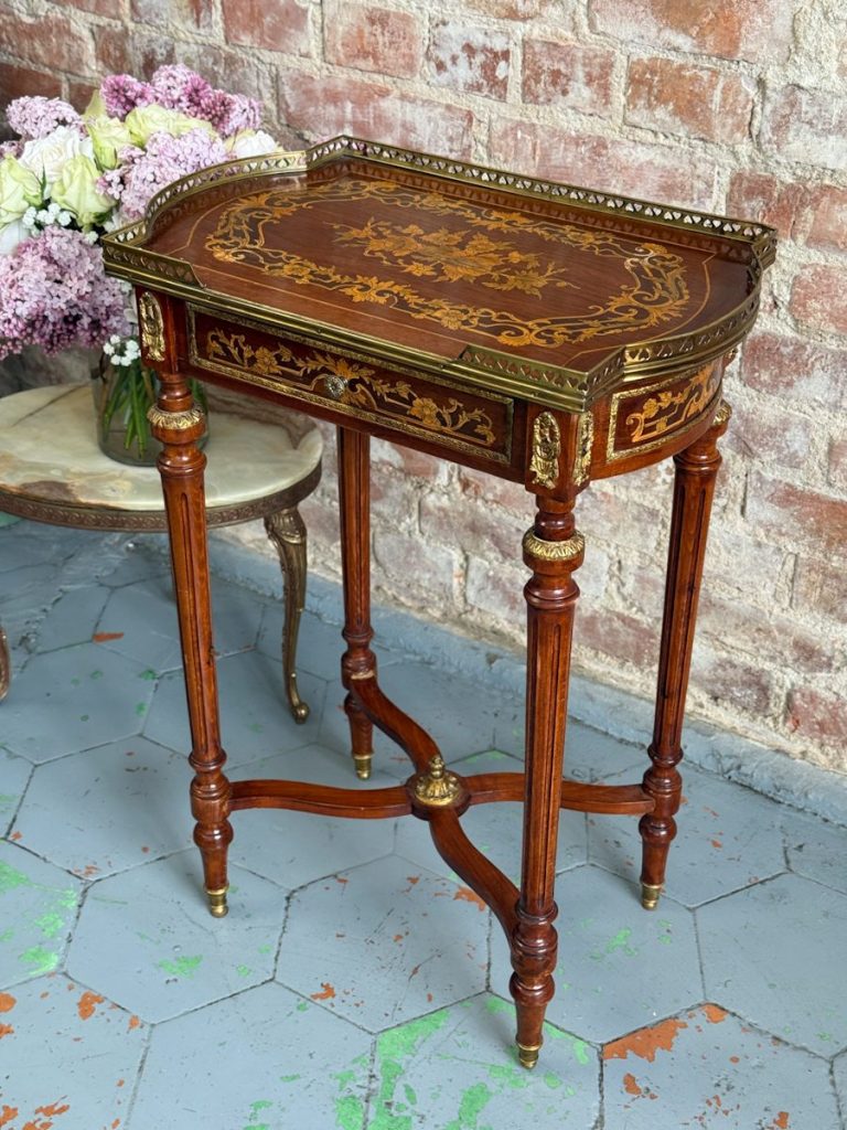 Antique Louis XVI style mahogany side table with floral marquetry inlay and brass gallery