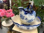Antique French Majolica majolica style glazed earthenware shell wash basin and pitcher set with gold gilt accents.