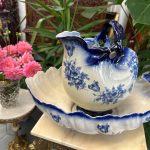 Antique French Majolica majolica style glazed earthenware shell wash basin and pitcher set with gold gilt accents.