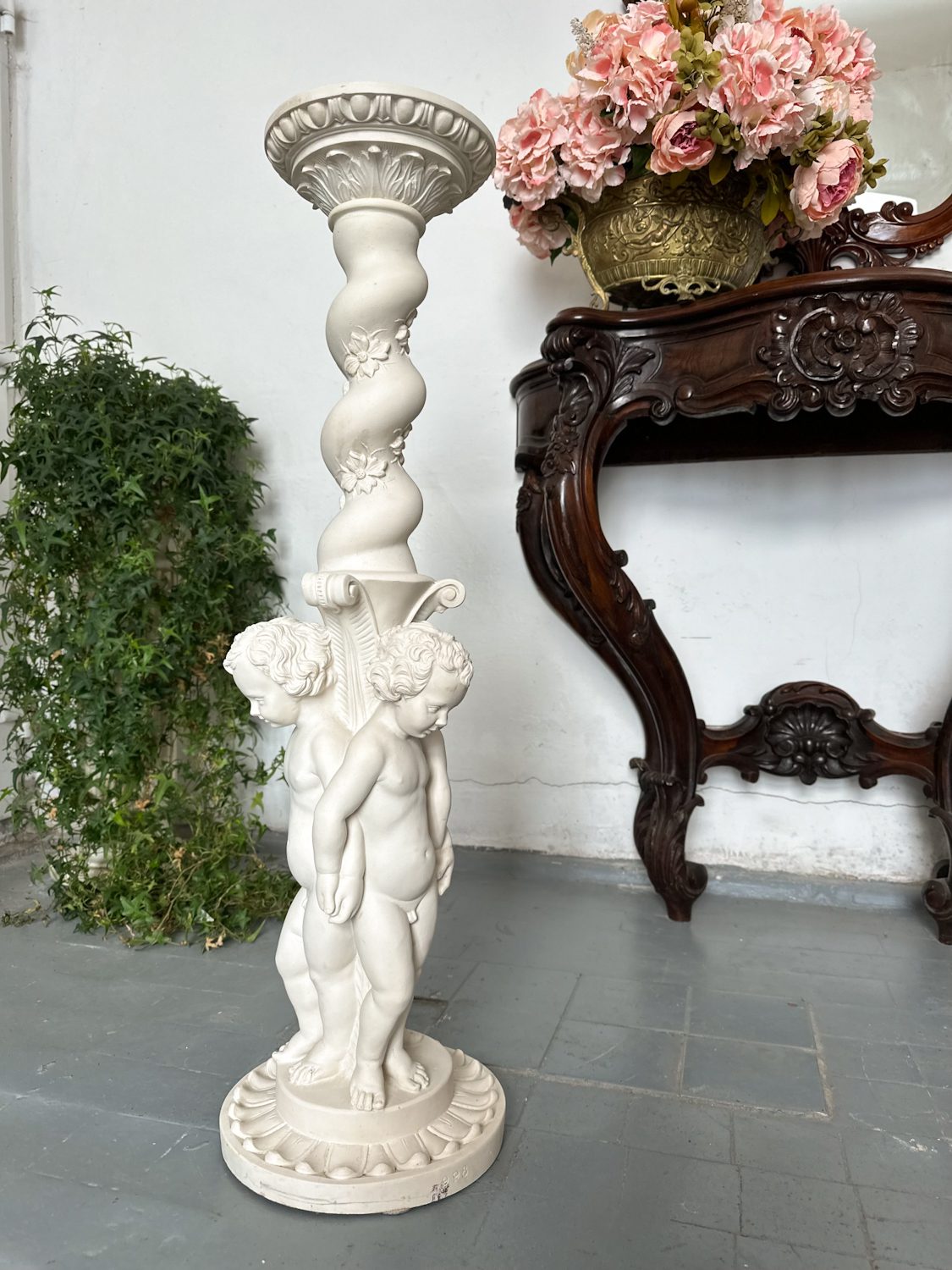 IMG_2102 Cherub pedestal column in cast stone with two carved putti and twist-carved floral shaft