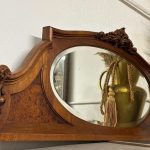large antique walnut mirror with beveled glass