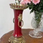 antique red porcelain vase with bronze lion handles