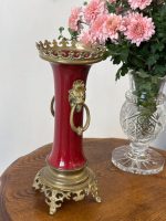 antique red porcelain vase with bronze lion handles