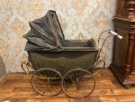 large antique carriage style baby stroller