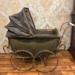 large antique carriage style baby stroller