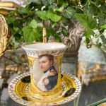 antique porcelain cup with saucer featuring napoleon portrait