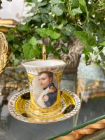 antique porcelain cup with saucer featuring napoleon portrait