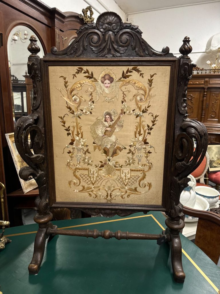 Antique carved oak needlework firescreen with silk embroidered panel