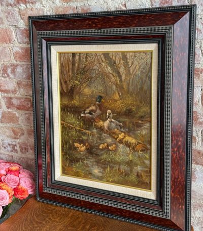 antique style duck family oil painting on canvas in heavy tortoiseshell pattern flame frame