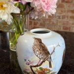 Small Limoges porcelain vase with painted bird motifs