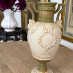 Small matte porcelain Royal Dux vase with classical female figures and green accents in Art Nouveau style
