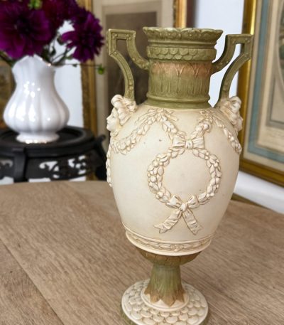 Small matte porcelain Royal Dux vase with classical female figures and green accents in Art Nouveau style