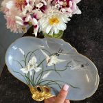 Beautiful light blue limoges porcelain stork dish with hand-painted irises and a gold handle in Art Nouveau style.
