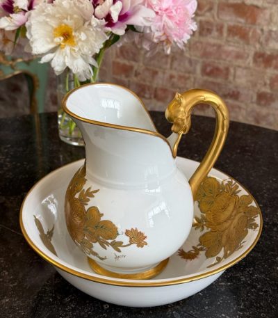 limoges porcelain pitcher and basin set with heavy gold floral detailing signed by m. caffy