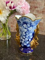 Beautiful blue limoges porcelain vase with hand-painted floral motif and ornate gold handles in Neo-Rococo style.