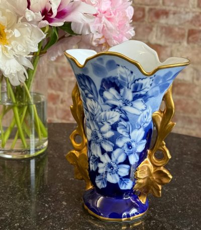 Beautiful blue limoges porcelain vase with hand-painted floral motif and ornate gold handles in Neo-Rococo style.