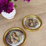 pair of mini vintage framed portraits with mirrored bevelled glass frames
