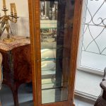 antique wooden display cabinet with marble top