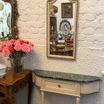 Elegant Louis XVI style cream console table with green marble top and matching mirror set