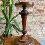 small carved wood pedestal stand