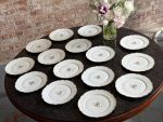15 antique porcelain plates by ch pillivuyt with gold monogram and scalloped edges