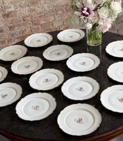 15 antique porcelain plates by ch pillivuyt with gold monogram and scalloped edges
