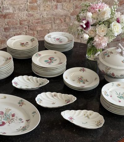 antique porcelain dinner service by hache jullien vierzon with floral decor