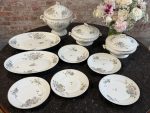 Antique Silesian porcelain dinner service with floral motif and gold trim