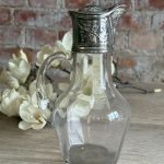 antique glass claret jug with silver plated mount