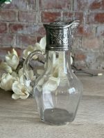 antique glass claret jug with silver plated mount