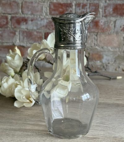 antique glass claret jug with silver plated mount