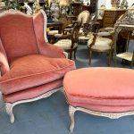 Antique French Louis XV style bergère wingback armchair with matching ottoman in terracotta velvet