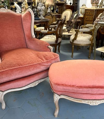 Antique French Louis XV style bergère wingback armchair with matching ottoman in terracotta velvet
