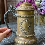 Antique bronze presentation tankard with lid and historical German engraving