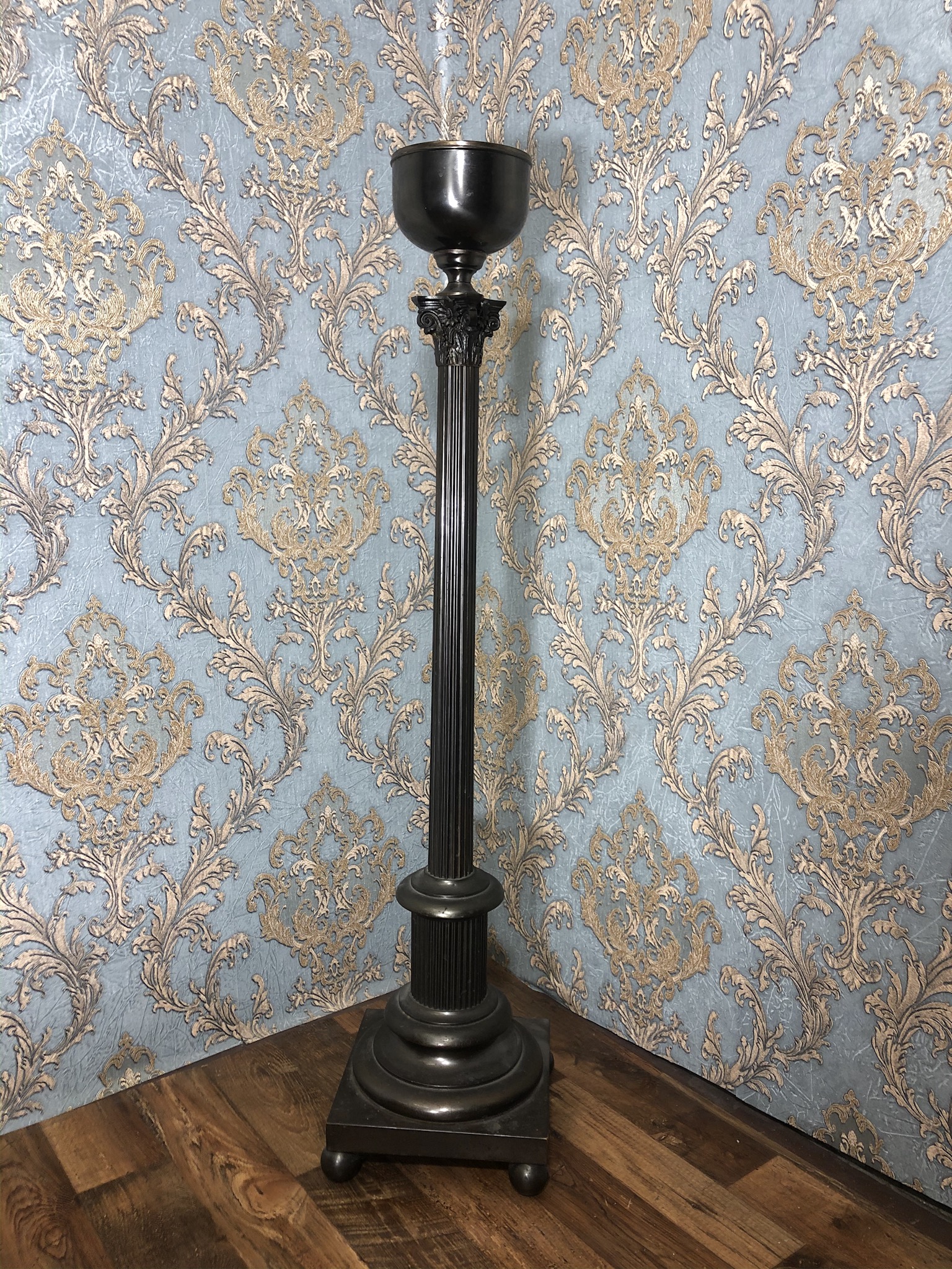 metal Corinthian column plant stand