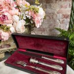 Antique 19th century silver handle carver set featuring a long carving knife