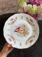 “Limoge” porcelāna šķīvis ar eņģeļiem, vidēja izmēra (7210)